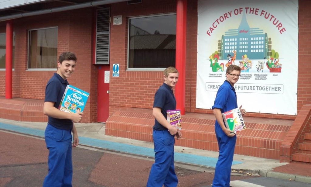 3 Kelloggs Workers standing outside of the Kelloggs factory